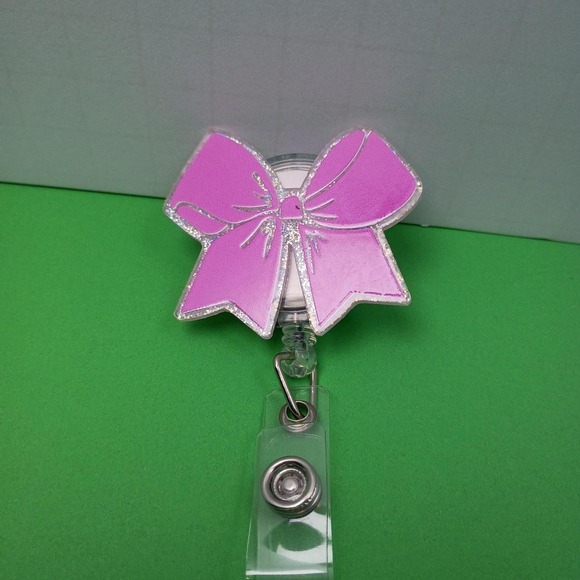 Other - Pink glitter bow badge reel